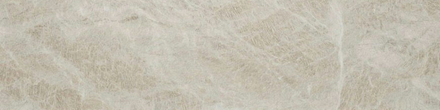 Across a Taj Mahal slab in a leather finish, soft cream with pale veining